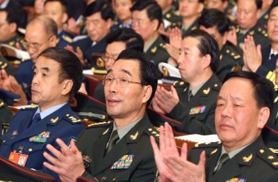 中国评论新闻:解放军代表:实现富国强军的统一